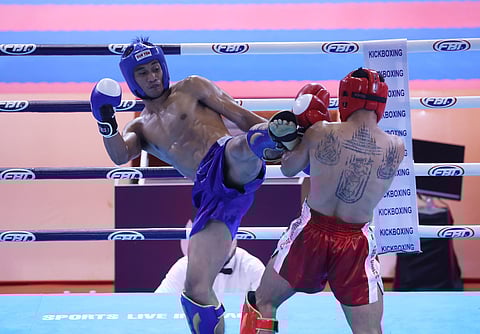 JEAN Claude Saclag dominates Rakim San of Cambodia to clinch the gold medal in the men’s low kick 63.5-kilogram kickboxing event of the 32nd SEA Games. SEAG POOL PHOTO