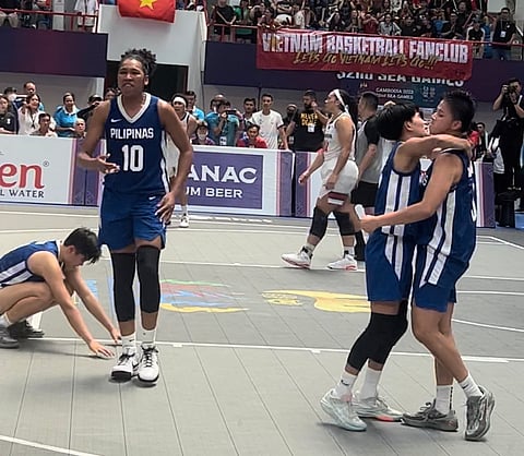 Gilas Pilipinas 3x3 women’s team celebrate after hurdling Cambodia, 21-20, in the SEA Games women’s 3x3 semis match Sunday at the Morodok Techo National Stadium Elephant Hall 2. Photo by Rey Joble