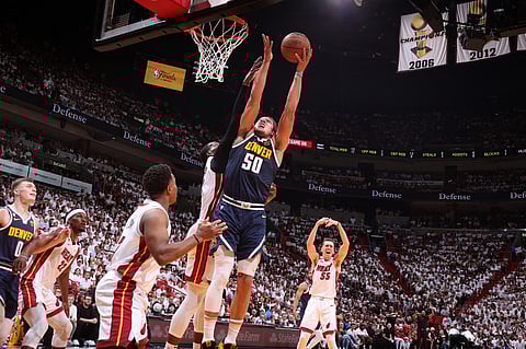 Aaron Gordon of the Denver Nuggets drives to the basket during Game Four of the 2023 NBA Finals against the Miami Heat on June 9, 2023 at Kaseya Center in Miami, Florida. Photo by Nathaniel S. Butler / NBAE / Getty Images / Getty Images via AFP