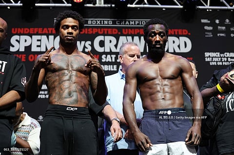 Errol Spence Jr. faces off against Terrence Crawford during their weigh-in at T-Mobile Arena on July 28, 2023. Spence Jr. and Crawford will fight for the Undisputed World Welterweight Championship at T-Mobile Arena in Las Vegas on July 29. Al Bello/Getty Images/AFP Photo by AL BELLO / GETTY IMAGES NORTH AMERICA / Getty Images via AFP