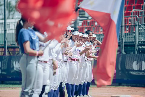 Members of the Philippine Blu Girls softball team hold their heads up high after getting eliminated in the Women's Softball World Cup. (Photo from WBSC)