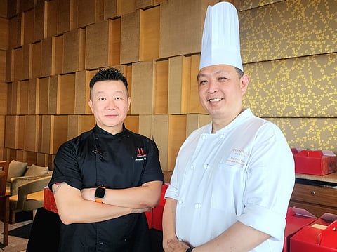 Celebrity chef Jereme Leung (left) and China Blue's executive Chinese chef Eng Yew Khor. Photographs courtesy of Ximena Bala.