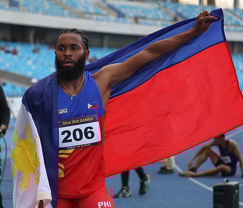Eric Cray continuously carries the Philippine colors with pride.