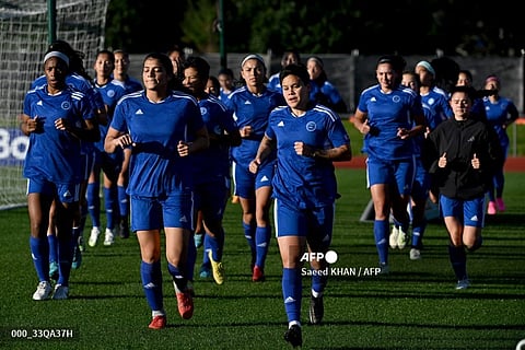 Team Philippines during its training ahead of the Women's World Cup football match against Norway. (Photo by Saeed KHAN / AFP)