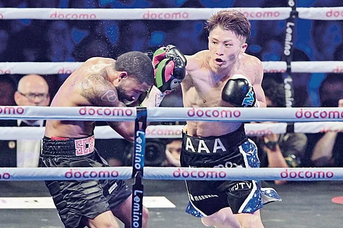 Naoya Inoue (in action) looks forward to a unification bout with Marlon Tapales | KAZUHIRO NOGI/AGENCE FRANCE-PRESSE