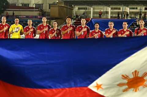 Members of the national women’s football team (Photo by Nhac NGUYEN/AGENCE FRANCE-PRESSE)