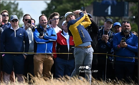 2022 Open champion, Australia's Cameron Smith watches his shot from the 16th tee during a practice round ahead of the 151st British Open Golf Championship at Royal Liverpool Golf Course in Hoylake, north west England.
Paul ELLIS / AFP