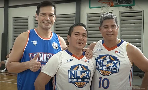 Philippine Basketball Association legends Alvin Patrimonio and Jojo Lastimosa join NLEX Road Warriors board representative Ronald Dulatre in participating in the Benefit Game of the JJLHS Alumni Association. (Photo by Erick Villanueva, Daily Tribune)