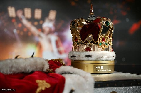 (FILES) Freddie Mercury's signature crown and cloak ensemble, worn throughout Queen's 1986 'Magic' Tour, is pictured during a press preview ahead of the "Freddie Mercury: A World of His Own" auctions, at Sotheby's auctioneers in London on August 3, 2023. Thousands of items belonging to the charismatic Queen frontman Freddie Mercury, from manuscripts of his band's biggest hits to furniture, paintings and knick-knacks, go under the hammer in London. (Photo by Daniel LEAL / AFP)