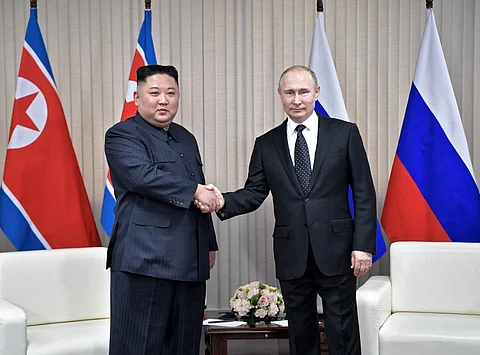 FILE PHOTO: Russian President Vladimir Putin meets with North Korean leader Kim Jong Un at the Far Eastern Federal University campus on Russky island in the far-eastern Russian port of Vladivostok on 25 April 2019. (Photo by Alexey NIKOLSKY / SPUTNIK / AFP)
