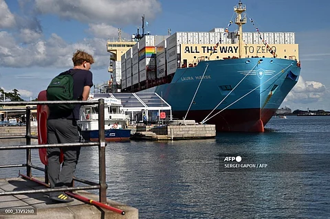 A view taken on September 14, 2023 shows the worlds first methanol-enabled container vessel called "Laura Maersk" of A.P. Moller-Maerska after its namegiving ceremony in Copenhagen. Built in South Korea by Hyundai Heavy Industries (HHI) and fitted with a dual-fuel engine, "Laura Maersk" is a relatively small model that will be able to transport 2,136 20-foot (TEU) containers. It will begin operating in the Baltic Sea in October 2023, Maersk said. (Photo by SERGEI GAPON / AFP)