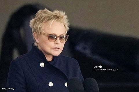 French actress Muriel Robin delivers a speech during a national homage to late French actor Michel Bouquet at the Hotel des Invalides in Paris on April 27, 2022. French cinema has been forced to question the place it reserves for LGBT performers, following a shocking testimony by Muriel Robin about her difficulties in imposing herself on screen as an openly lesbian actress. (Photo by Francois Mori / POOL / AFP)