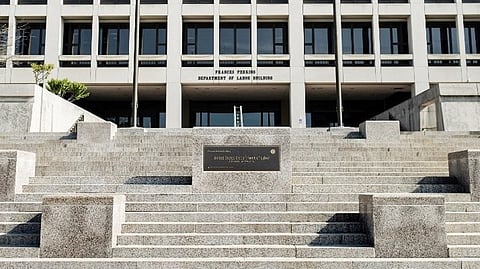 FILE PHOTO: A view of the US Department of Labor building on 3 May 2013 in Washington, DC. (Photo by Brendan SMIALOWSKI / AFP)