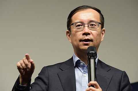 FILE PHOTO: Daniel Zhang, Alibaba Group CEO, delivers a speech. (Photo by NICOLAS TUCAT / AFP)