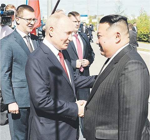VLADIMIR SMIRNOV/POOL/AGENCE FRANCE-PRESSE
RUSSIA’S President Vladimir Putin shakes hands with North Korea’s leader Kim Jong Un during their meeting at the Vostochny Cosmodrome in Amur region on 13 September.