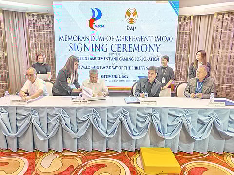 PAGCOR chairman and CEO Alejandro Tengco (seated, second from left) and DAP president and CEO Engelbert Caronan, Jr. (seated, second from right) sign a memorandum of agreement for DAP’s technical services in the agency’s reorganization efforts. With them are PAGCOR VP for Human Resource and Development Group Angelito Domingo (extreme left) and DAP VP for Mindanao Mark Lemuel Garcia (extreme right). | Photograph courtesy of PAGCOR