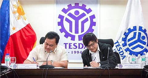 TESDA Secretary Suharto Mangudadatu ang Armani Mikhail A. Alcayaga, executive director of GoDigital Pilipinas, signed the MoA to provide ICT skills training to TESDA trainees.