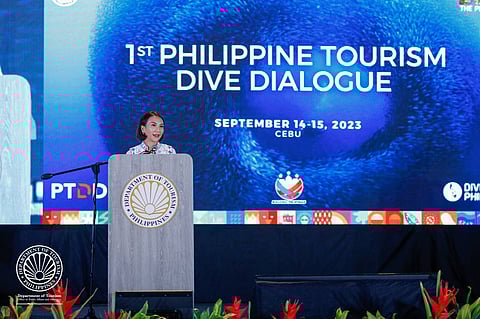 Tourism Secretary Christina Garcia Frasco addressing her speech during the first-ever Dive Dialogue in Cebu on Thursday. | photograph courtesy of DoT