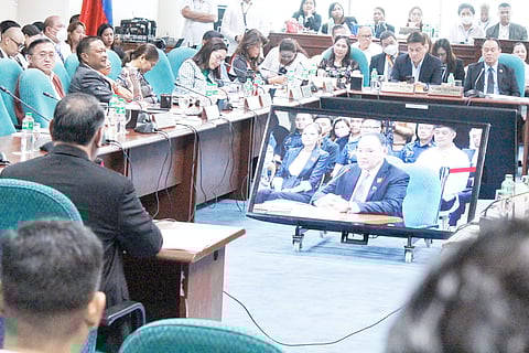 PHOTOGRAPH BY DIANNE BACELONIA FOR THE DAILY TRIBUNE
Secretary Gilbert ‘Gibo’ Teodoro Jr. (seen on the monitor) faces the Commission on Appointments in the Senate on Wednesday. The 12-member CA deferred from questioning Teodoro as a ‘courtesy’ to a former Tarlac's 1st District representative and approved his ad interim appointment as Department of National Defense chief.