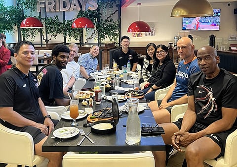 The Meralco Bolts, headed by new coach Luigi Trillo and his assistant coaches Norman Black and Nenad Vucinic, as well as team manager Paolo Trillo, welcome new import Feron Hunt. (Photo from Luigi Trillo)