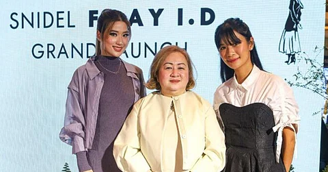 PHOTOGRAPHS COURTESY OF SNIDEL & FRAY Federal Land Retail Holdings president Mae Jeanjaquet (center) with Tricia Gosingtian and Janeena Chan.