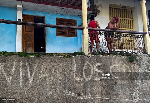 View of a wall with a graffiti of the Committees for the Defense of the Revolution (CDR) in Santiago de Cuba, on September 24, 2023. September 28 marks the 63th anniversary of the Committees for the Defense of the Revolution (CDR), the so-called "eyes and ears of the Revolution" created by the late Cuban leader Fidel Castro. (Photo by YAMIL LAGE / AFP)