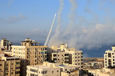 ROCKETS are fired from Gaza City towards Israel on 7 October 2023. Sirens warning of incoming fire blared in Israel. | MAHMUD HAMS/AGENCE FRANCE-PRESSE