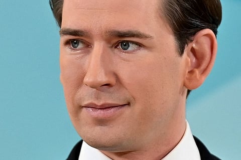 FILE PHOTO: Former Austrian Chancellor Sebastian Kurz gives a press conference in Vienna, on 2 December 2021. (Photo by Joe Klamar / AFP)