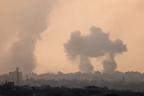 FILE PHOTO: A picture taken from Israel's southern city of Sderot shows smoke billowing during a Israeli strike on Gaza on 22 October 2023, amid ongoing battles between Israel and the Palestinian group Hamas. (Photo by Jack Guez / AFP)