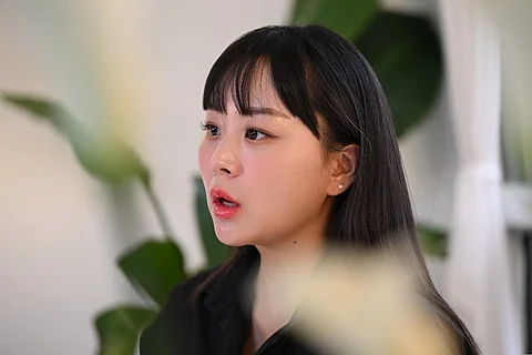This picture taken on 26 October 2023 shows Itaewon Halloween crush survivor Kim Cho-long speaking during an interview with AFP at a studio in Seoul. (Photo by Jung Yeon-je / AFP)