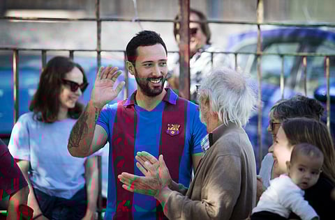 Spanish rapper Jose Miguel Arenas Beltran, also known as Valtonyc greets fans as he arrives in Sineu, on Mallorca Island, on 29 October 2023. Josep Miquel Arenas seeked asylum in Belgium after he was accused of glorifying the Basque separatist group ETA, and insulting the Crown in Spain, and sentenced to three and a half year in prison by Spanish justice. (Photo by JAIME REINA / AFP)