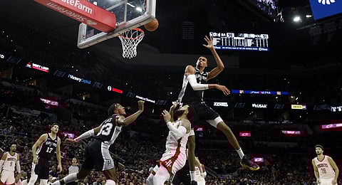 Towering rookie Victor Wembanyama and the San Antonio Spurs outlast the Houston Rockets, 126-122, in overtime. | RONALD CORTES/
AGENCE FRANCE-PRESSE