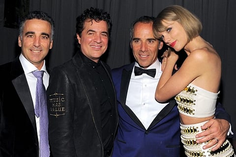 FILE PHOTO: (L-R) President/COO Republic Records Avery Lipman; Scott Borchetta, CEO of Republic Records Monte Lipman, and recording artist Taylor Swift attend the Republic Records Grammy Celebration presented by Chromecast Audio at Hyde Sunset Kitchen & Cocktail on 15 February 2016 in Los Angeles, California. (Photo by ANGELA WEISS / GETTY IMAGES NORTH AMERICA / Getty Images via AFP)