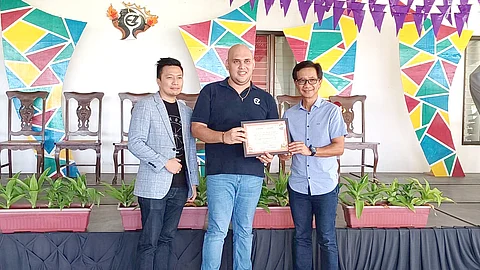 (L-R) William Ignacio, Globe's Head of Program Delivery and Strategy, Dr. Henry Leen Magahis, OIC and Principal of Enzo Zobel Foundation-Senior High School, Oscar Visaya, Country General Manager for Palo Alto Networks Philippines | Photograph courtesy of GLOBE