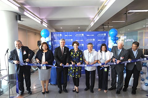 Opening the inaugural flight are (from left) United Airlines regional director for APAC Walter Dias, country manager for Sales-Philippines Pam Navarro, managing director for International Sales Marcel Fuchs, US Ambassador to the Philippines MaryKay Carlson, Department of Transportation Undersecretary Roberto Lim, Department of Tourism regional director Sharlene Batin, American Chamber of Commerce executive director Ebb Hinchliffe, general manager for Airport operations-Guam Samuel Shinohara. | Photograph courtesy of United Airlines