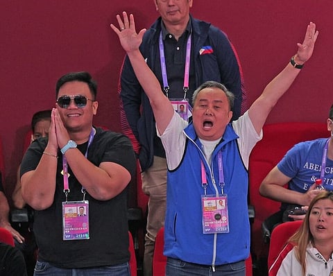 POC president Abraham ‘Bambol’ Tolentino celebrates after Eumir Marcial knocked out Ahmad Ghousoon of Syria in the men’s 80-kilogram boxing event of the 19th Asian Games.(PHOTOGRAPH COURTESY OF POC-PSC MEDIA GROUP
)