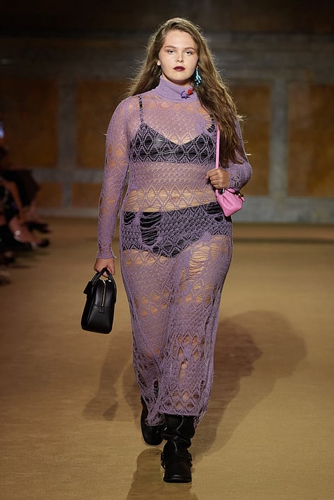 slip dress crafted with lace and fabric. | PHOTOGRAPHS COURTESY OF Coach