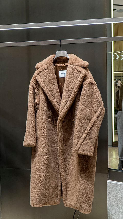 Soft and fluffy, feels much like a teddy bear coat.