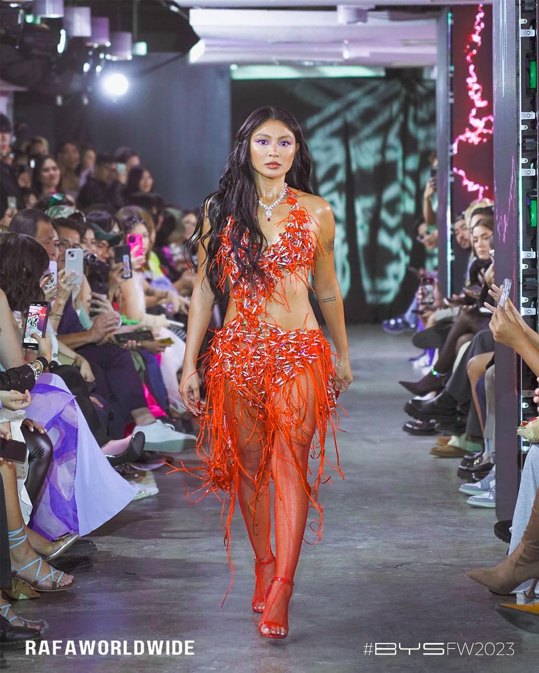 Nadine Lustre in red ensemble showing innovative use of recycled fabrics by Raf Villas.