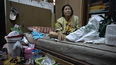 "I wish the government could provide more support because right now the cost of living is skyrocketing," said 73-year-old Chusri Kaewkhio in Bangkok's Khlong Toei slum. (Photo: Lillian SUWANRUMPHA / AFP)