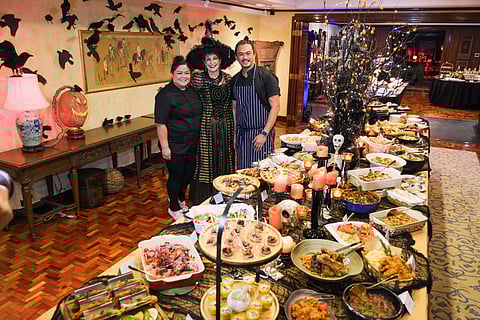 U.S. Ambassador MaryKay Carlson (center) with chefs Ivory Yat Vaksman and Kalel Chan.