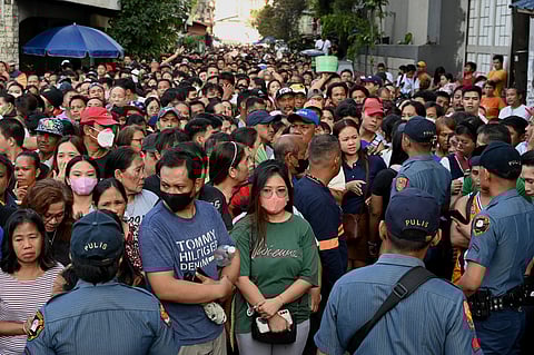 What low turnout? Poll officials have predicted a 70-percent turnout for the Barangay and Sangguniang Kabataan Elections on Monday. This may be an understatement if one considers the crowd that endured long queues to vote in Manila. | JAM STA ROSA/AGENCE FRANCE-PRESSE