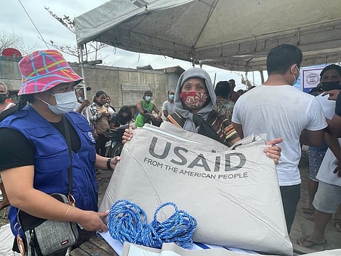 USAID distributed heavy-duty tarpaulins to meet the emergency shelter needs of 9,400 families after Typhoon Odette.