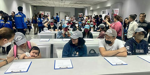 They’re home Fifty-nine Filipinos await processing upon their arrival Monday afternoon from Israel via Abu Dhabi. They’re the third batch of repatriates from the country now on the verge of waging a ground war against the Hamas terror group. | PHOTOGRAPH BY anthony ching FOR THE DAILY TRIBUNE@tribunephl_ton