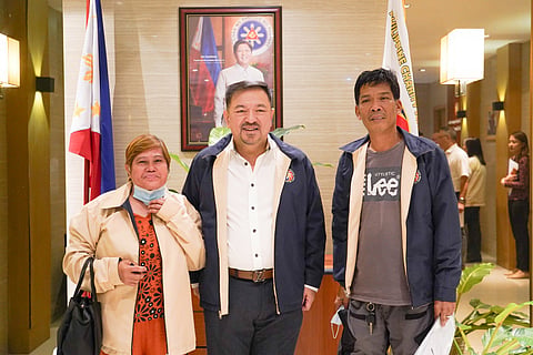 Lotto winner Antonio Mendoza and his wife meet with PCSO General Manager Melquiades Robles at the PCSO Main Office in Mandaluyong City on 25 October 2023 regarding the claiming of his winnings in the Lotto 6/42 drawn on 2 October 2014, which was delayed for nine years due to damaged ticket.
