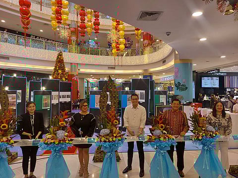 ribbon-cutting ceremony led by UPMG president Barbie Atienza (fourth from left) with special guests.