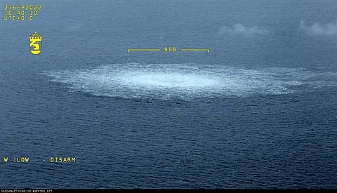This handout photo released on September 27, 2022 and taken from an aircraft of the Swedish Coast Guard (Kustbevakningen) shows the release of gas emanating from a leak on the Nord Stream 1 gas pipeline, with the leak measuring over 950 meters in diameter, in the Swedish economic zone in the Baltic Sea, near the Danish island of Bornholm. Photo by Handout / SWEDISH COAST GUARD / AFP