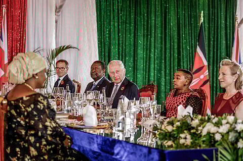 Britain's King Charles III (C) attends the State Banquet hosted by Kenyan President William Ruto at the State House in Nairobi on 31 October 2023. (Photo by Luis Tato / POOL / AFP)