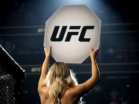 FILE PHOTO: UFC Octagon Girl Chrissy Blair introduces a round during the UFC 273 event at VyStar Veterans Memorial Arena on 9 April 2022 in Jacksonville, Florida. (Photo by James Gilbert / GETTY IMAGES NORTH AMERICA / Getty Images via AFP)