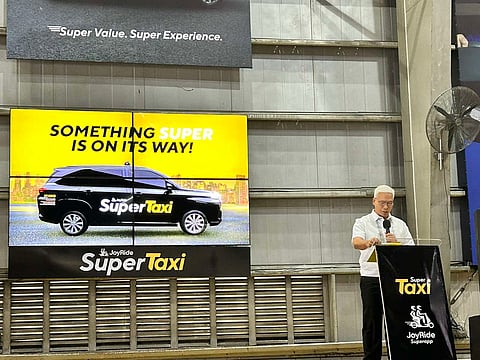 Photograph by Maria Bernadette Romero for the Daily Tribune.
JoyRide senior vice president for corporate affairs Noli Eala speaks at the launch of JoyRide Super Taxi service, the toughest challenge launched on traditional taxicabs.